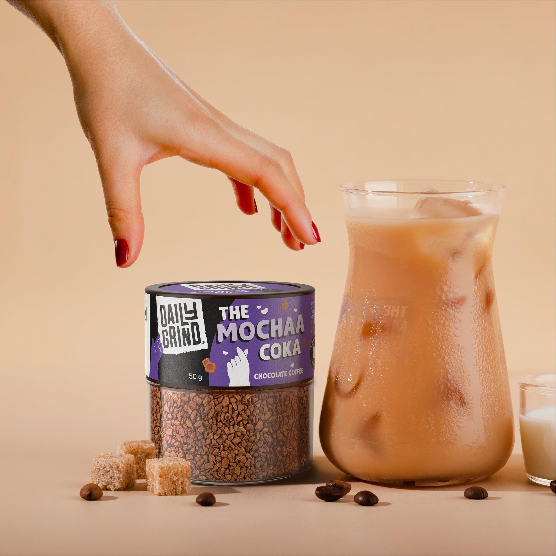 Hand Holding Chocolate Coffee Jar